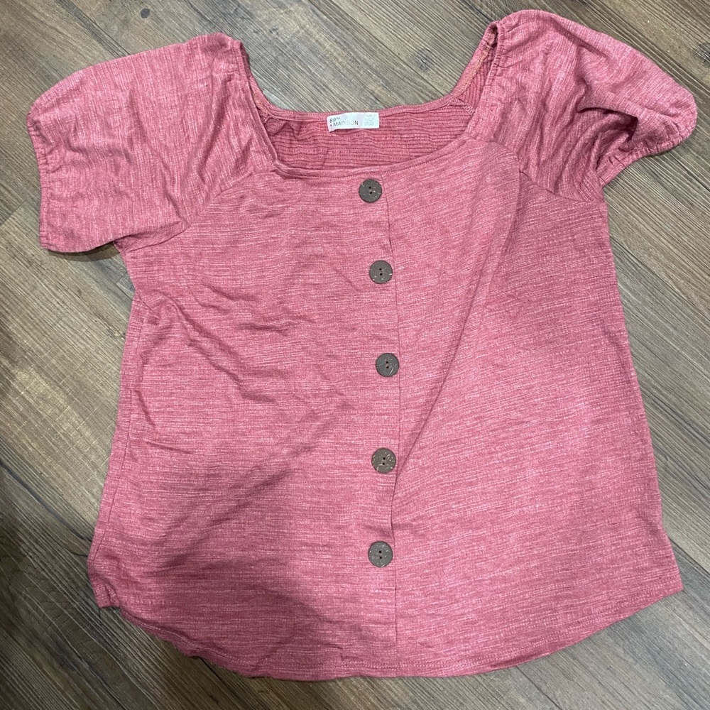 Women’s pink top with buttons